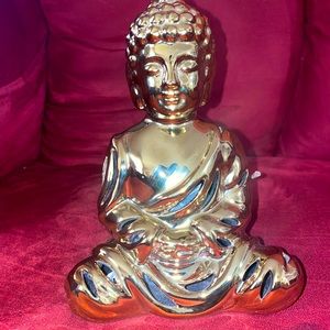 Shiny gold Buddha figurine